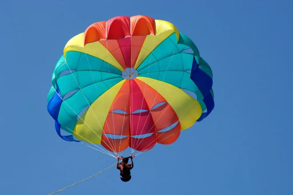 Parasailing over the beach in Side, Turkey with hotel pickup included
