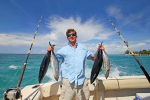 Side Fishing Tour 25 Dolphins swimming near fishing boat during Side Turkey fishing tour return to harbor