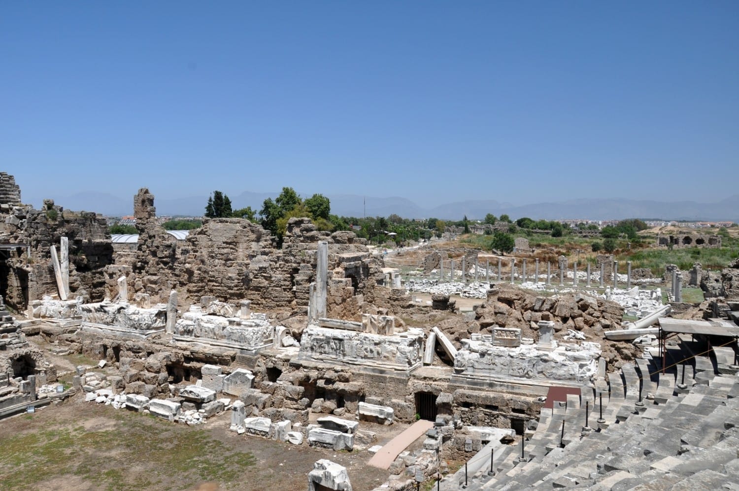Exterior view of the Roman theatre at Side Ancient City showing the barrel-vaulted substructure